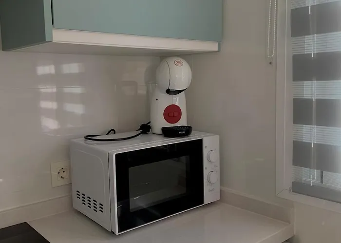 Un Descanso Junto Al Mar Апартаменты *